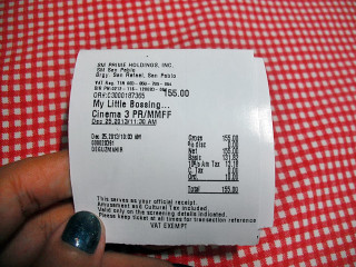 Movie theater receipt checkered background - a person holding free wallpaper