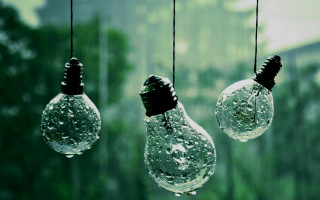 Hanging light bulbs raindrops building - bruce munro free wallpaper