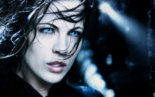Woman blue eyes black jacket 4 - a black jacket free wallpaper