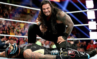Wrestler held over ring crowd - the sideline free wallpaper