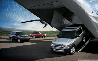 Range rover jeep plane runway - a plane in the background free wallpaper