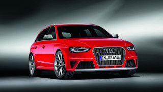 Red car spotlight black background - spot free wallpaper