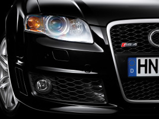 Car closeup license plate headlights - detailed face free wallpaper