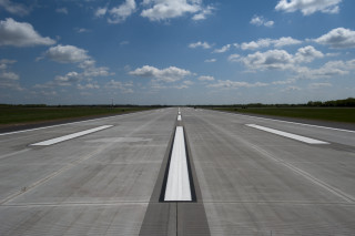Runway white lines blue sky - turnaround free wallpaper