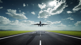 Jetliner flying runway blue sky 2 - turnaround free wallpaper