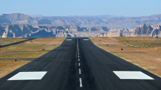 Runway mountain skyline plane background - turnaround free wallpaper