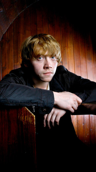 Young man wooden wall serious - young free wallpaper
