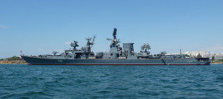 Battleship floating water shoreline buildings - building free wallpaper