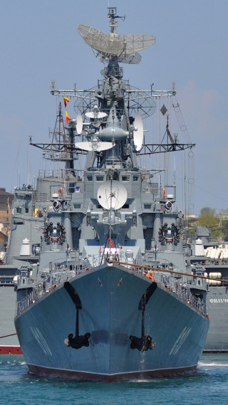 Battleship water sky boats building - front view free wallpaper
