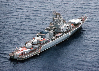 Large ship ocean smaller boat 4 - nearby free wallpaper