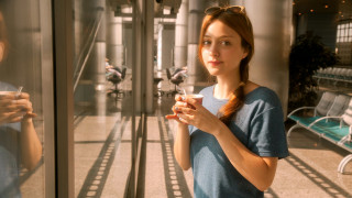 Woman glass door coffee cell 2 - her cell phone free wallpaper