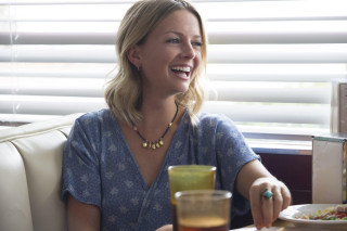 Woman smiling at table with - private free wallpaper