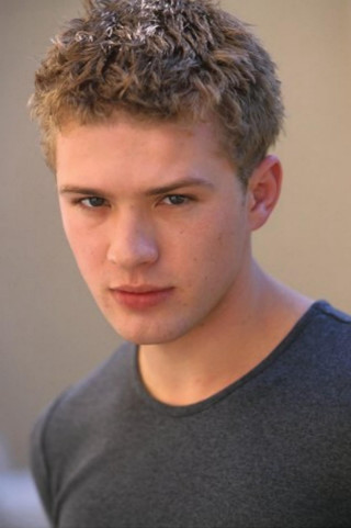 Young man serious grey shirt - andrew bell free wallpaper