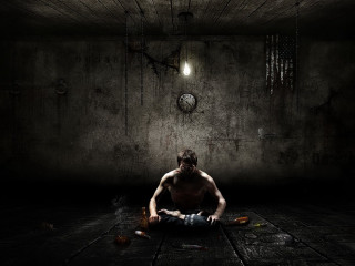Man sitting dark room clock 3 - the wall behind free wallpaper