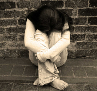 Woman sitting ground head down 3 - stuckism free wallpaper