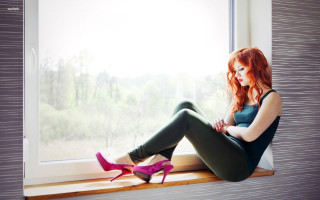 Woman sitting window sill legs - a window sill free wallpaper