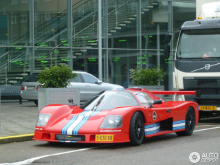 Red race car bus street - a bus free wallpaper