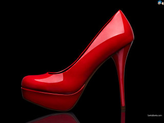 Red high heeled shoe black - a black surface free wallpaper