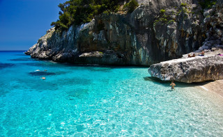 Beach rock formation clear water 5 - free bikini wallpaper