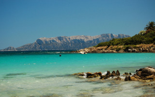 Beach mountain clearwater boat sunset - clear water free wallpaper