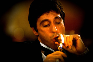 Man tuxedo lighting cigarette lighter - a lighter free wallpaper