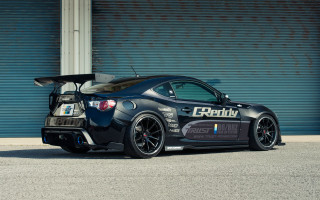 Black sports car garage surfboard - a surfboard free wallpaper