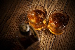 Whiskey glasses bottle still life - a wooden table top free wallpaper