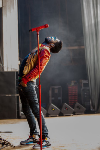 Man skateboard pole microphone standing - a pole free wallpaper