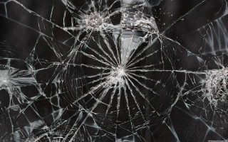 Broken glass window person background - a broken glass window free wallpaper