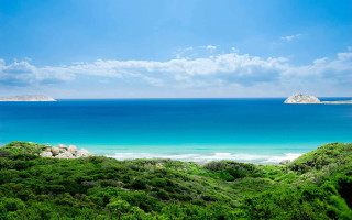 Beach blue sky ocean white - a blue sky and ocean in the background free wallpaper