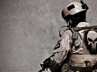 Man helmet vest gun skull - his hand and a skull free wallpaper