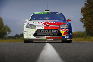 Car driving red bull livery - a road free wallpaper