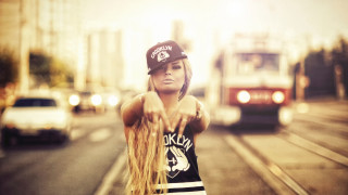 Woman long hair pointing tram - a street free wallpaper
