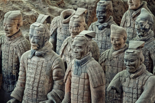 Statues men armor cave mountain - a cave free wallpaper