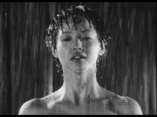 Woman standing rain eyes closed - video art free wallpaper