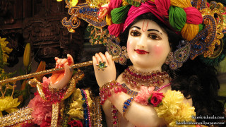 Statue woman flute flower hair 2 - a statue of a woman free wallpaper