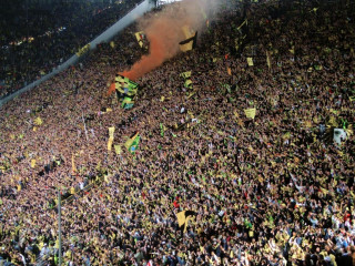 Crowd soccer game smoke flags - huge scene free wallpaper