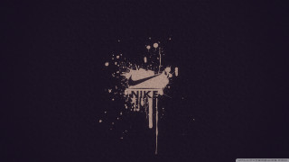 Nike logo splattered dark background - brush stroke free wallpaper