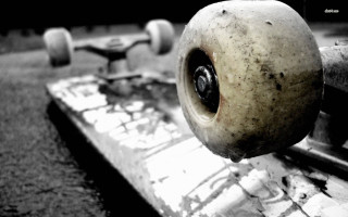 Skateboard broken wheel closeup side - broken free wallpaper