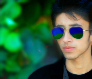 Man sunglasses green blue background - sunglass free wallpaper