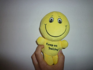 Yellow stuffed smiley face keep - david young cameron free wallpaper