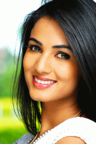 Woman smiling necklace green field - her face and a necklace free wallpaper