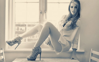 Woman window sill legs crossed - a window sill free wallpaper