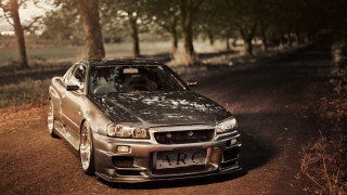 Car parked dirt road woods - luxury free wallpaper