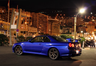 Blue car parking lot night 2 - a parking lot free wallpaper
