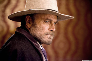 Man hat suit serious look - arnold mesches free wallpaper