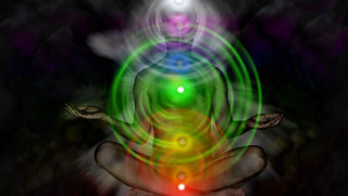 Person sitting lotus chakra light - a lotus position free wallpaper