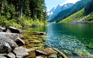 Mountain lake trees rocks background 2 - a mountain lake free wallpaper