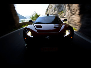 Car driving cliff mountain background - the front of the car free wallpaper