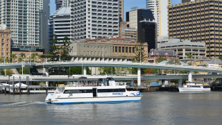 Boat river city skyline tall 2 - a river next free wallpaper
